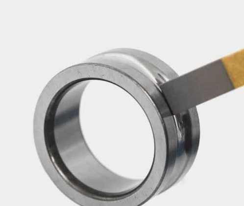 Superfinishing a bearing ring.