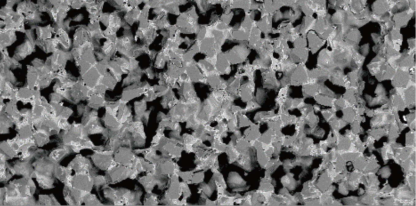 Vitrified wheel pore structure for the outer race.