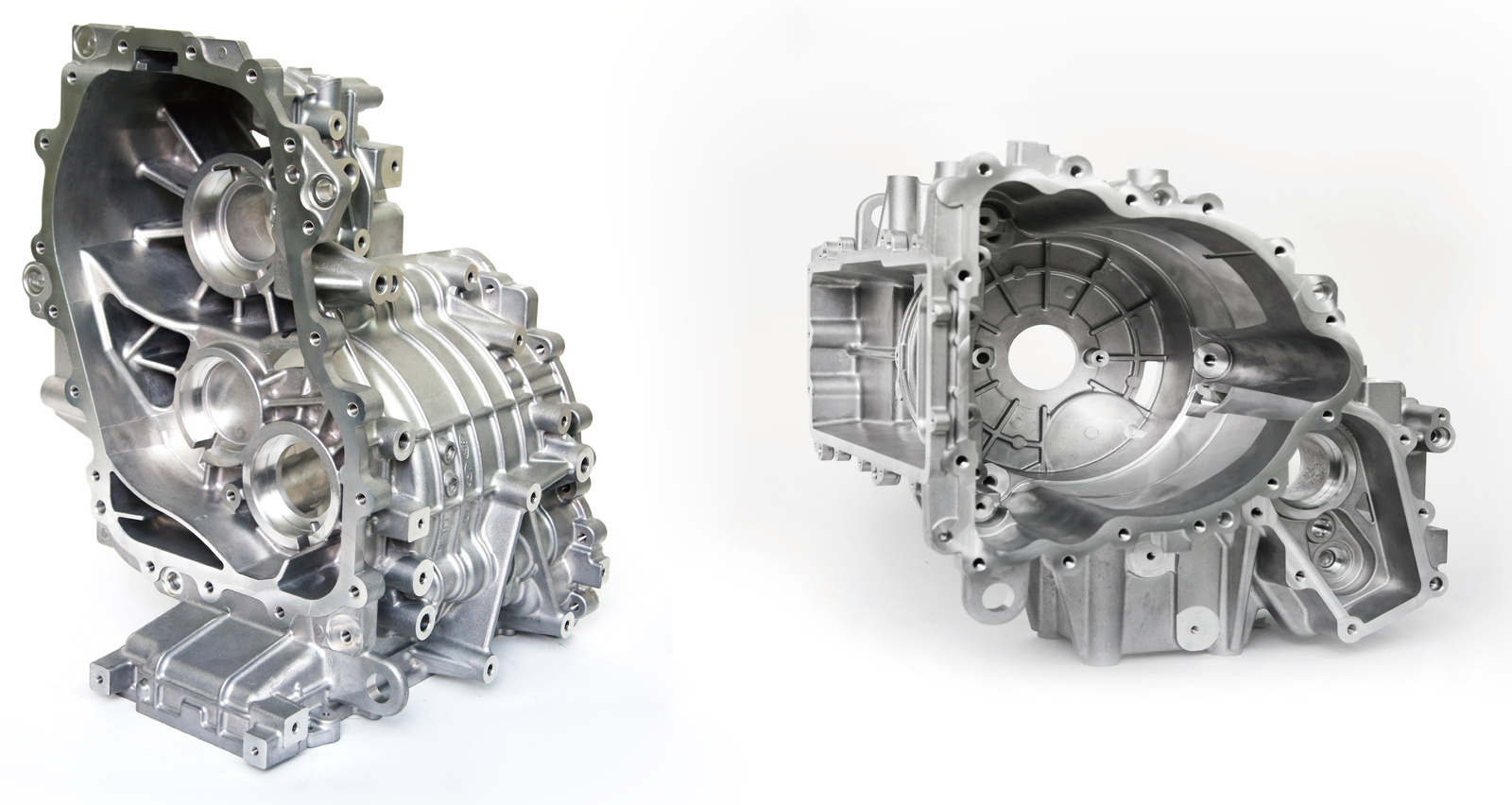 Two motor housings as workpiece examples.