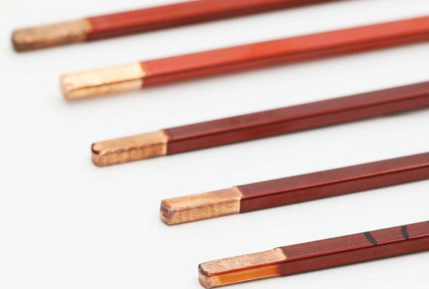 Hairpin copper conductors with stripped ends as an application example.