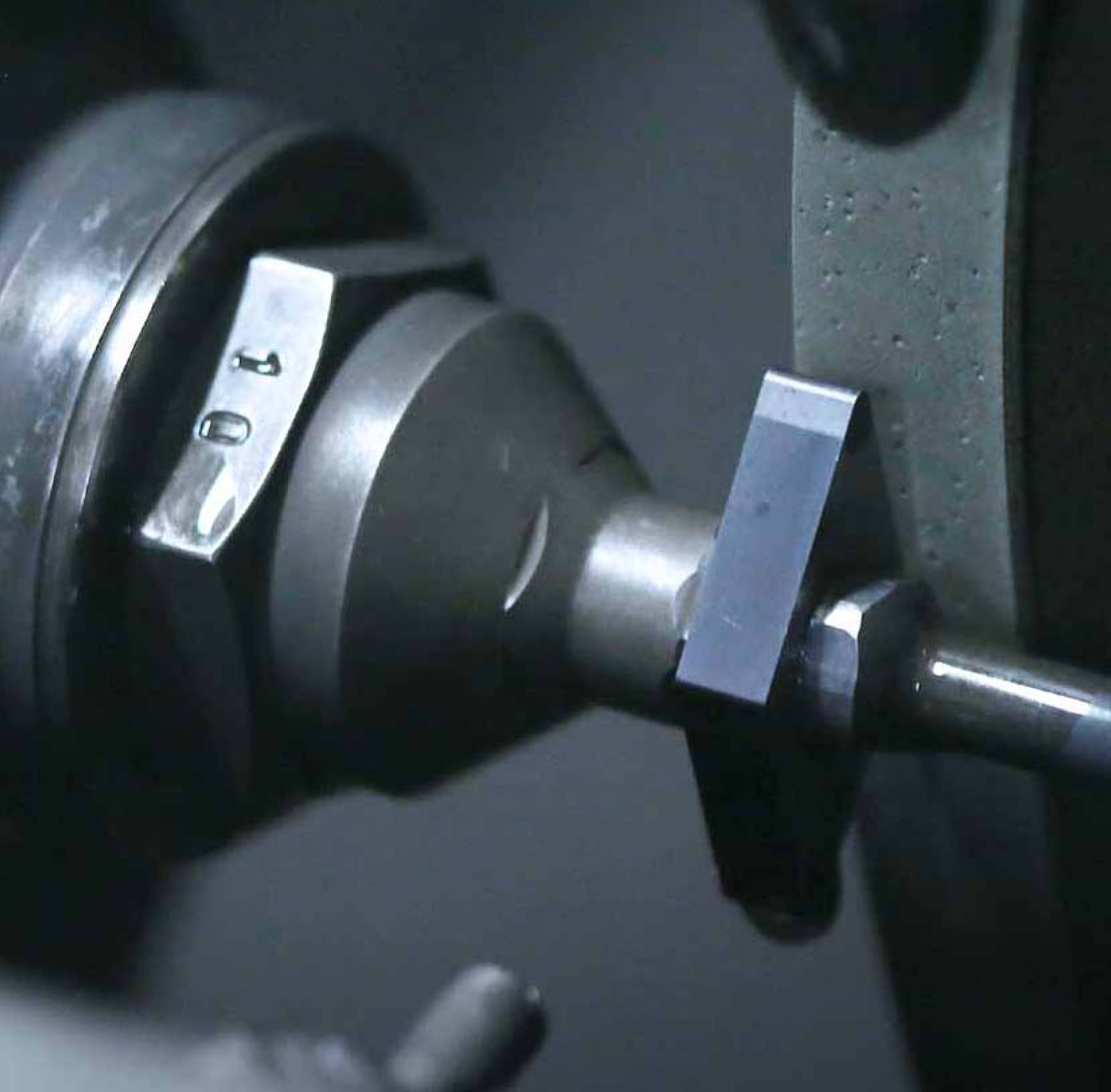 Peripheral grinding of a cutting insert