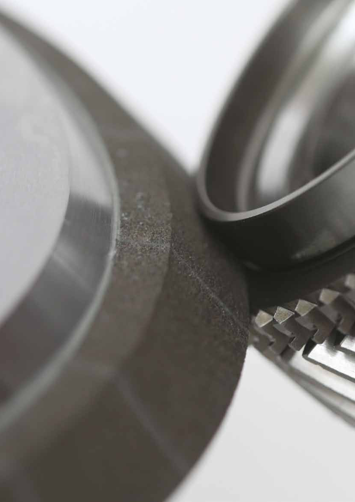 Profiled grinding tools and layer structure
