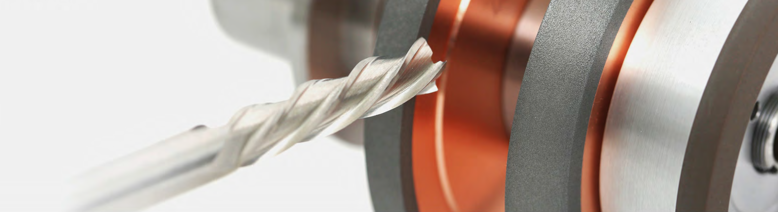 Tool and grinding wheel during flute grinding