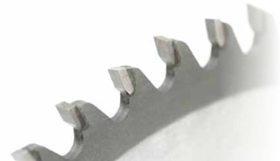 Carbide-tipped saw blade as the workpiece.