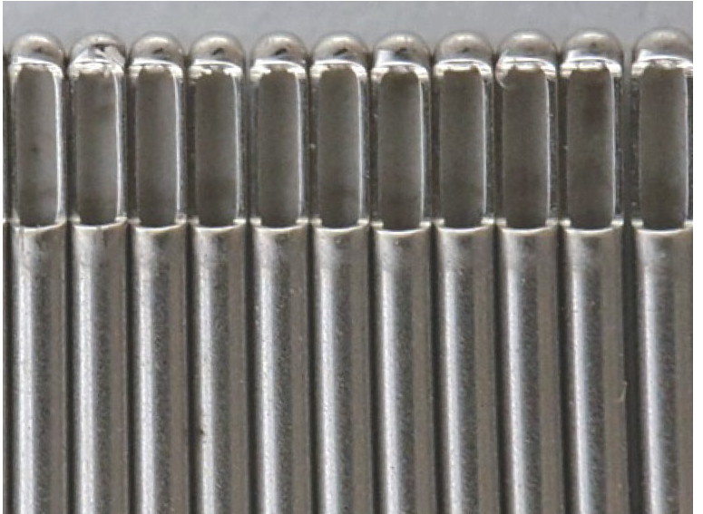 Burr-free needle tips in the illustrated ECG comparison.