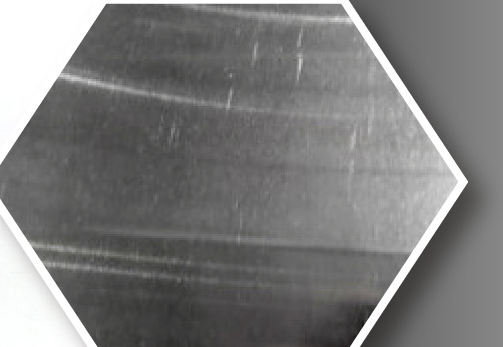 Surface example: conventional abrasive wheel.